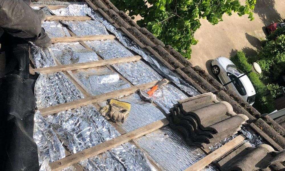 Nieuwe panlatten met dakpannen in Duiven